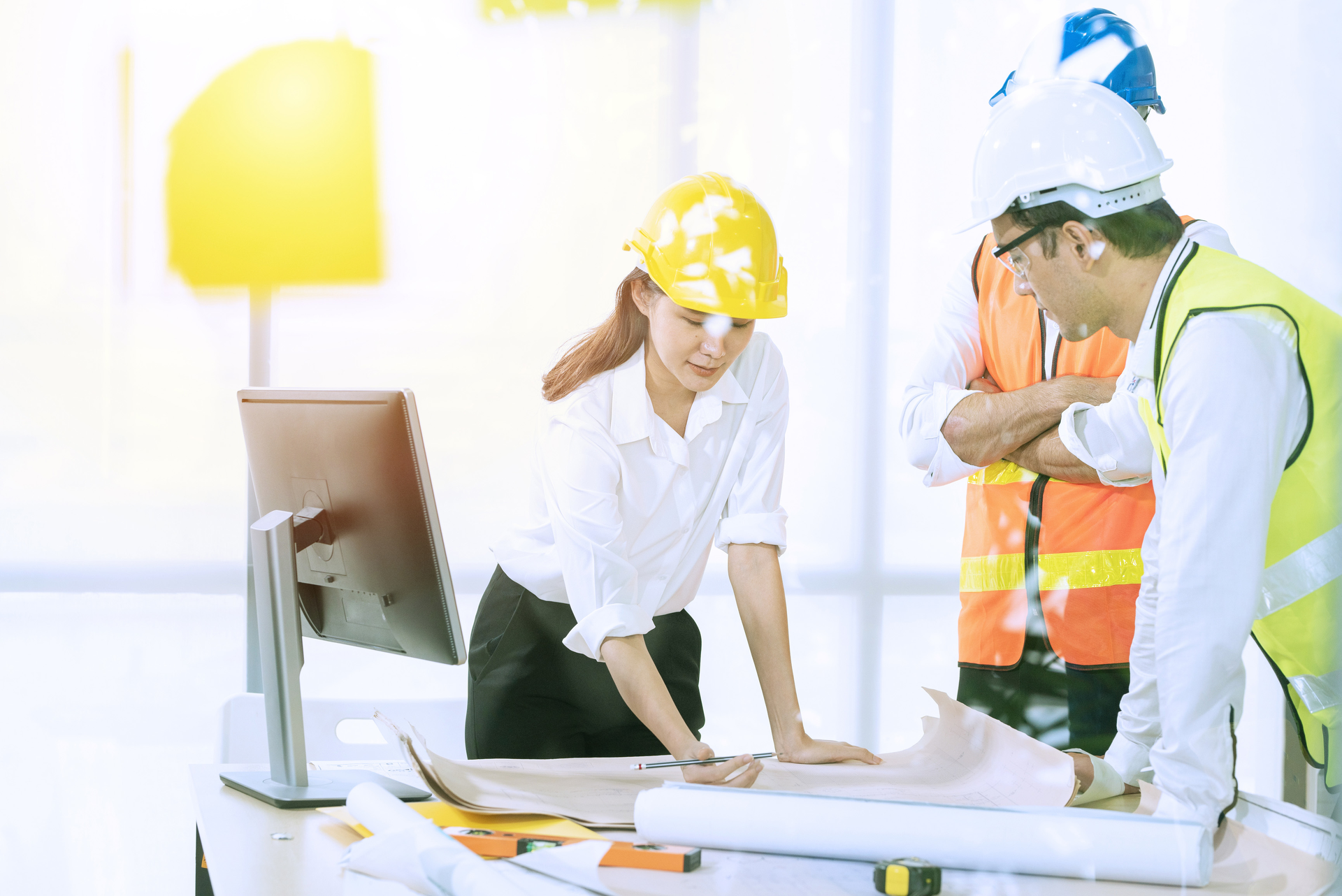 Engineers Discussing Building Plans Dreamstime Xl 180350547 60b794c60ed30