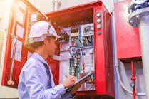 Engineer Inspecting Fire Alarm System Dreamstime Xl 138880528