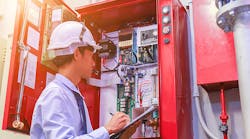 Engineer Inspecting Fire Alarm System Dreamstime Xl 138880528