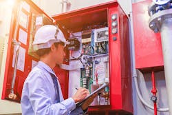 Engineer Inspecting Fire Alarm System Dreamstime Xl 138880528 60e4a22d1c87a Engineer Inspecting Fire Alarm System Dreamstime Xl 138880528 60e4a22d1c87a