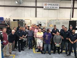 Matt Strand, president and CEO of Greaves Corp., shares the good news with employees after being presented the Gold Award trophy for the 2021 Product of the Year Competition.