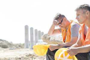 Construction Workers Taking Break From Heat Dreamstime Xl 55574525 Copy