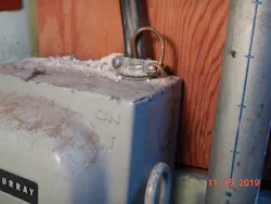 Equipment grounding conductor improperly bonded to a cable clamp