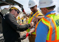 A Greenlee team member places sensors on key pressure points of a Knoxville Utilities Board employee. The quantitative data from the sensors will help KUB add to its existing ergonomics strategy by showing employees how new tools and work processes have a long-term effect on their bodies. A Greenlee team member places sensors on key pressure points of a Knoxville Utilities Board employee. The quantitative data from the sensors will help KUB add to its existing ergonomics strategy by showing employees how new tools and work processes have a long-term effect on their bodies.