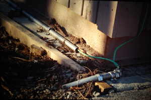 Ground conductors running through conduit sitting on the ground