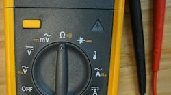 Photo 1. The digital multimeter (DMM) is the most commonly used type of multimeter. This DMM has a removable display for safety and can be used for various measurements, including AC and DC voltage and current, resistance, frequency, and temperature when the thermocouple accessory is used. Photo 1. The digital multimeter (DMM) is the most commonly used type of multimeter. This DMM has a removable display for safety and can be used for various measurements, including AC and DC voltage and current, resistance, frequency, and temperature when the thermocouple accessory is used.