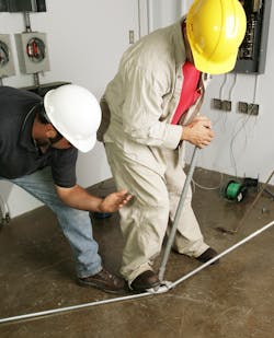 Photo 1. An electrical apprentice is learning how to bend ½-in. EMT, which is covered by Art. 358 in the NEC. Photo 1. An electrical apprentice is learning how to bend ½-in. EMT, which is covered by Art. 358 in the NEC.