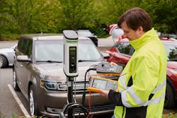 Photo 3. A technician can use an EV charging station adapter with other tools to check out EV equipment and identify common issues as part of a preventive maintenance program.