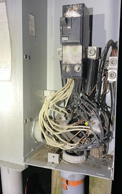 Electrical cables and a 200A overcurrent device in a metal enclosure Electrical cables and a 200A overcurrent device in a metal enclosure