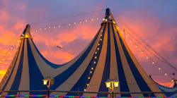 Circus tents at sunset