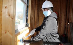 Dale Wolgamuth, who graduated in June 2022, is hammering in new work PVC boxes for receptacle and switch locations. Dale Wolgamuth, who graduated in June 2022, is hammering in new work PVC boxes for receptacle and switch locations.