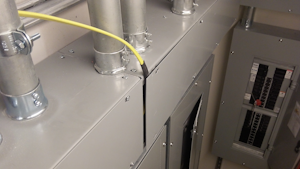 cable squeezed between the wireway and its cover