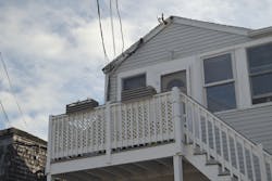 drip loops and overhead service conductor attached to roof eave drip loops and overhead service conductor attached to roof eave