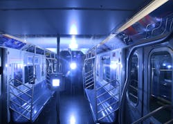 A New York City Metro Transit Authority subway car is bathed in germ-killing ultraviolet light emitted from portable and pole-based fixtures. A New York City Metro Transit Authority subway car is bathed in germ-killing ultraviolet light emitted from portable and pole-based fixtures.