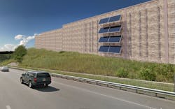 Solar panels on a highway sound barrier Solar panels on a highway sound barrier