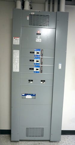 Photo 1. This 480V, 3-phase switchboard must be placed into an electrically safe work condition to remove the front cover and replace a breaker. Several bolts securing the front cover are missing, which would prevent the normal operation of the breakers. Missing bolts will be replaced when the work is completed. Photo 1. This 480V, 3-phase switchboard must be placed into an electrically safe work condition to remove the front cover and replace a breaker. Several bolts securing the front cover are missing, which would prevent the normal operation of the breakers. Missing bolts will be replaced when the work is completed.