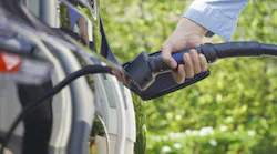 An electric vehicle being charged