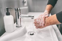 Man Washing Hands With Soap Safety Health And Wellness