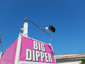 luminaire installed above ice cream shop sign