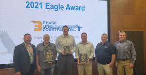 Three Phase Line Construction is the winner of Ameren’s 2021 Eagle, Best in Class, Best of the Best awards. Pictured left to right: Ty Lindhorst, Ameren Illinois, director of contractor services; and Three Phase Line employees Terry Long, Eric Burkey, Joseph Hamlin, Mike Wildman, and Mike Cherry.