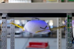 Kaiming Ye and Guy German from Binghamton University, State University of New York, developed a machine to disinfect personal protective equipment such as facemasks. Kaiming Ye and Guy German from Binghamton University, State University of New York, developed a machine to disinfect personal protective equipment such as facemasks.