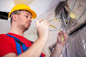 Electrician Working On Job Site Safety