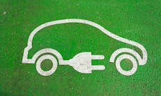 Electric Vehicle Logo on Pavement