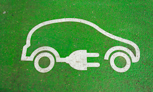 Electric Vehicle Logo on Pavement