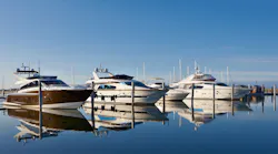 boats lined up in a marina