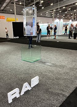 RAB Lighting went with a minimalist approach for its booth at LightFair. A RAB spokesperson said the two giant melting ice cubes suspended from the convention hall's rafters were intended to represent global warming, and how the company's lighting portfolio offers solutions to enhance sustainability on the planet. RAB Lighting went with a minimalist approach for its booth at LightFair. A RAB spokesperson said the two giant melting ice cubes suspended from the convention hall's rafters were intended to represent global warming, and how the company's lighting portfolio offers solutions to enhance sustainability on the planet.