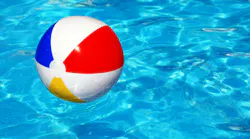 beach ball floating in a pool