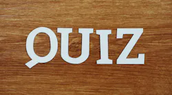 quiz letters on wooden surface