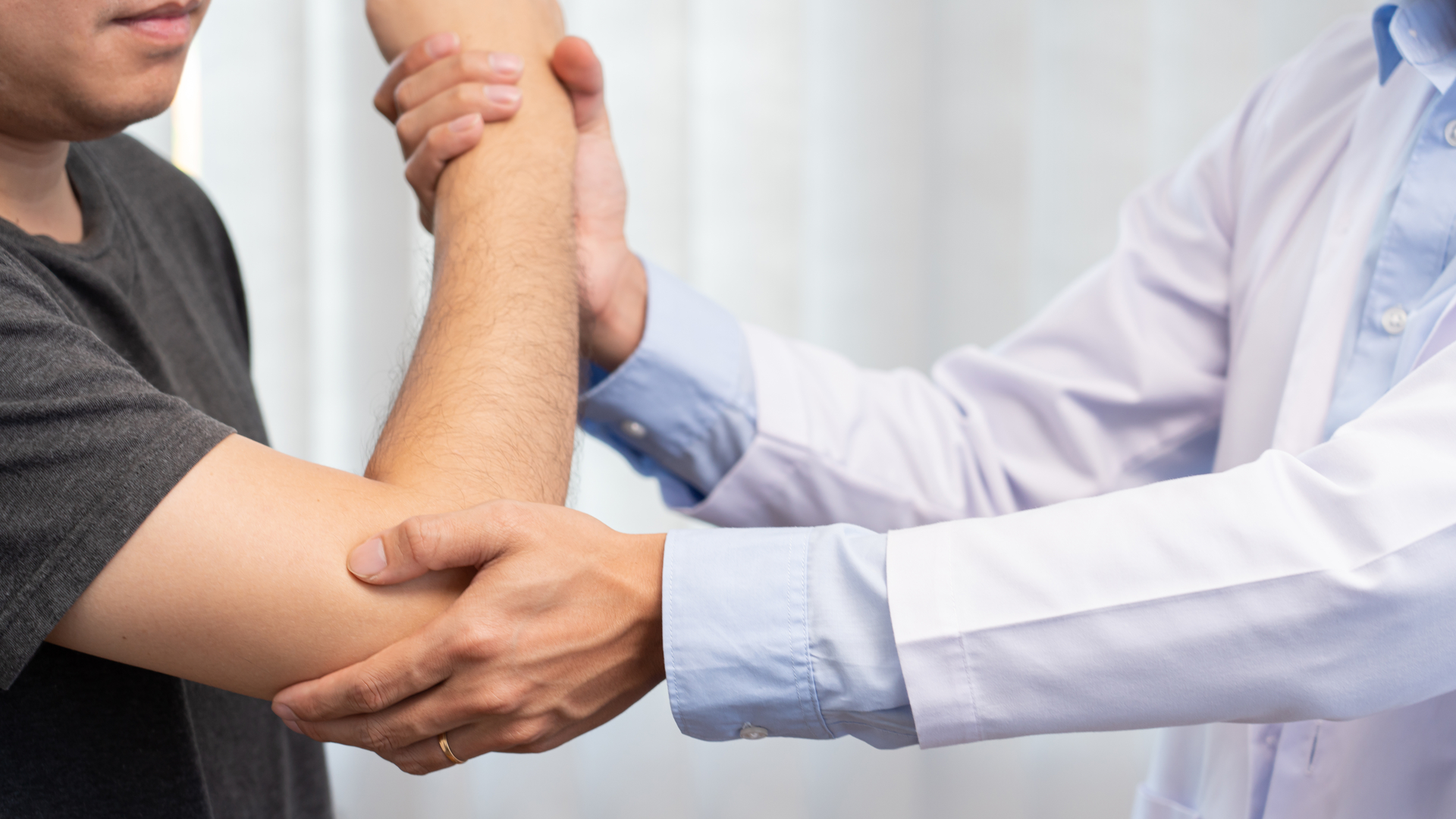 Elbow Pain Doctor And Patient Health And Wellness