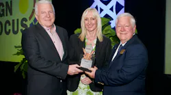 Past EASA Chairman Jerry Gray (right) presents EASA's 2022 Exceptional Achievement Service Award to David and Carol Griffin