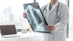 Doctorwith X Ray Of Lungs Disease Health