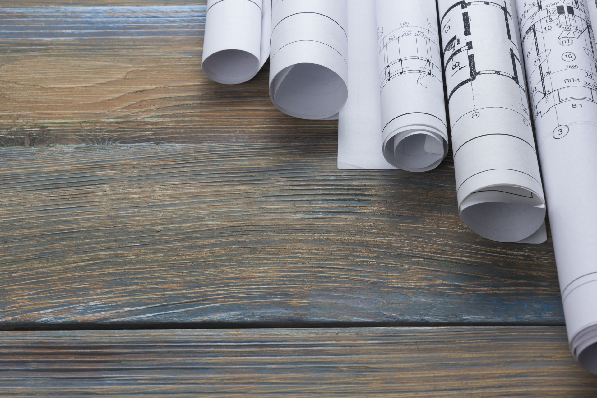 Estimating Promo Image Blueprints On Wood Desk Dreamstime Xl 68373710 617afd36a8f6a 63346dafa8d8c