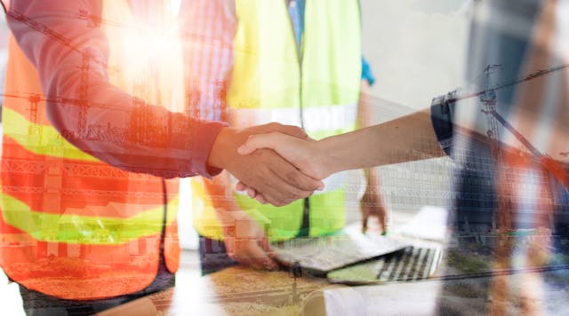 construction workers handshake agreement