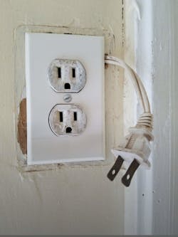 flexible extension cord installed behind receptacle outlet flexible extension cord installed behind receptacle outlet