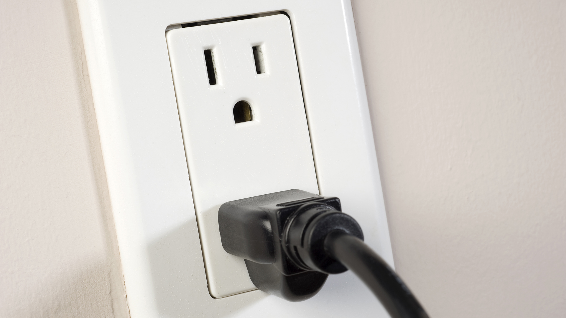 receptacle outlet with cord plugged in