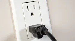 receptacle outlet with cord plugged in