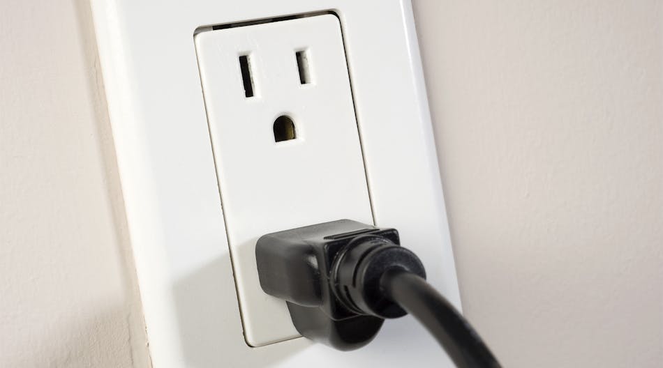 receptacle outlet with cord plugged in