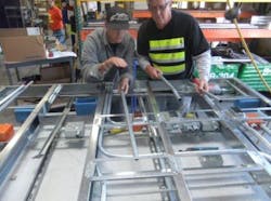 Photo 2. Had the electrical contractor not seen an opportunity to prefabricate the entire headwall as a preassembled section, then all of the work would have been completed on the job site as originally scheduled. Recognizing this opportunity saved thousands of hours. Photo 2. Had the electrical contractor not seen an opportunity to prefabricate the entire headwall as a preassembled section, then all of the work would have been completed on the job site as originally scheduled. Recognizing this opportunity saved thousands of hours.