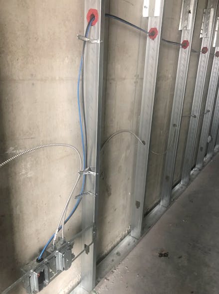 Photo 3. In this example, there are both low-voltage and electrical branch wiring present. Both scopes were done by the same company and installers but conducted in two passes. This work could have been combined into a single pass, using far less material-handling effort.