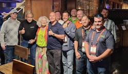 Vicki LaPlante, president emeritus of Joseph Groh Foundation, and board member John LaPlante (second from left) stand with some of the many contractors attending Service World Expo who helped raise $120,000 for the foundation.