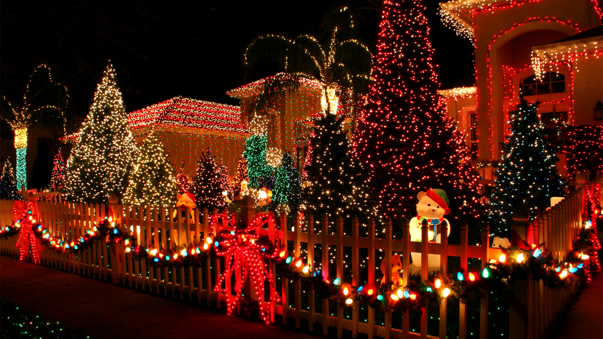 house decorated with festive holiday lighting