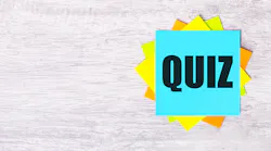quiz sticky notes on wooden background