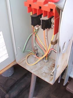 several equipment grounding conductors (EGCs) stuffed into a lug several equipment grounding conductors (EGCs) stuffed into a lug