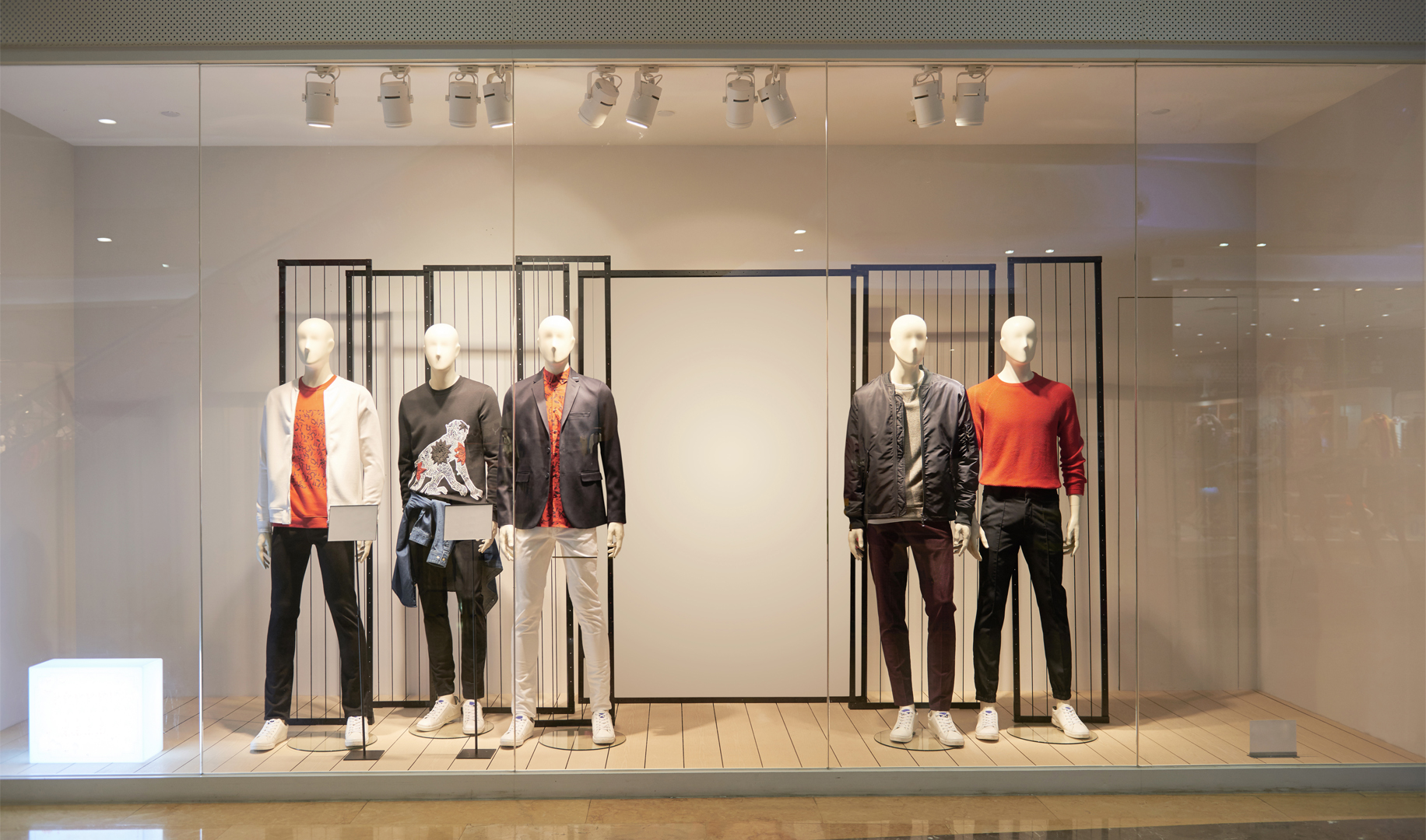 mannequins in a show window of a store