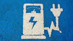 electric vehicle charging station logo on pavement