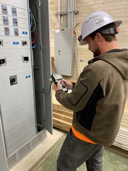 A technician performs 3-phase cable fault locating with a time domain reflectometer (TDR) in order to get the customer's power back on. A technician performs 3-phase cable fault locating with a time domain reflectometer (TDR) in order to get the customer's power back on.